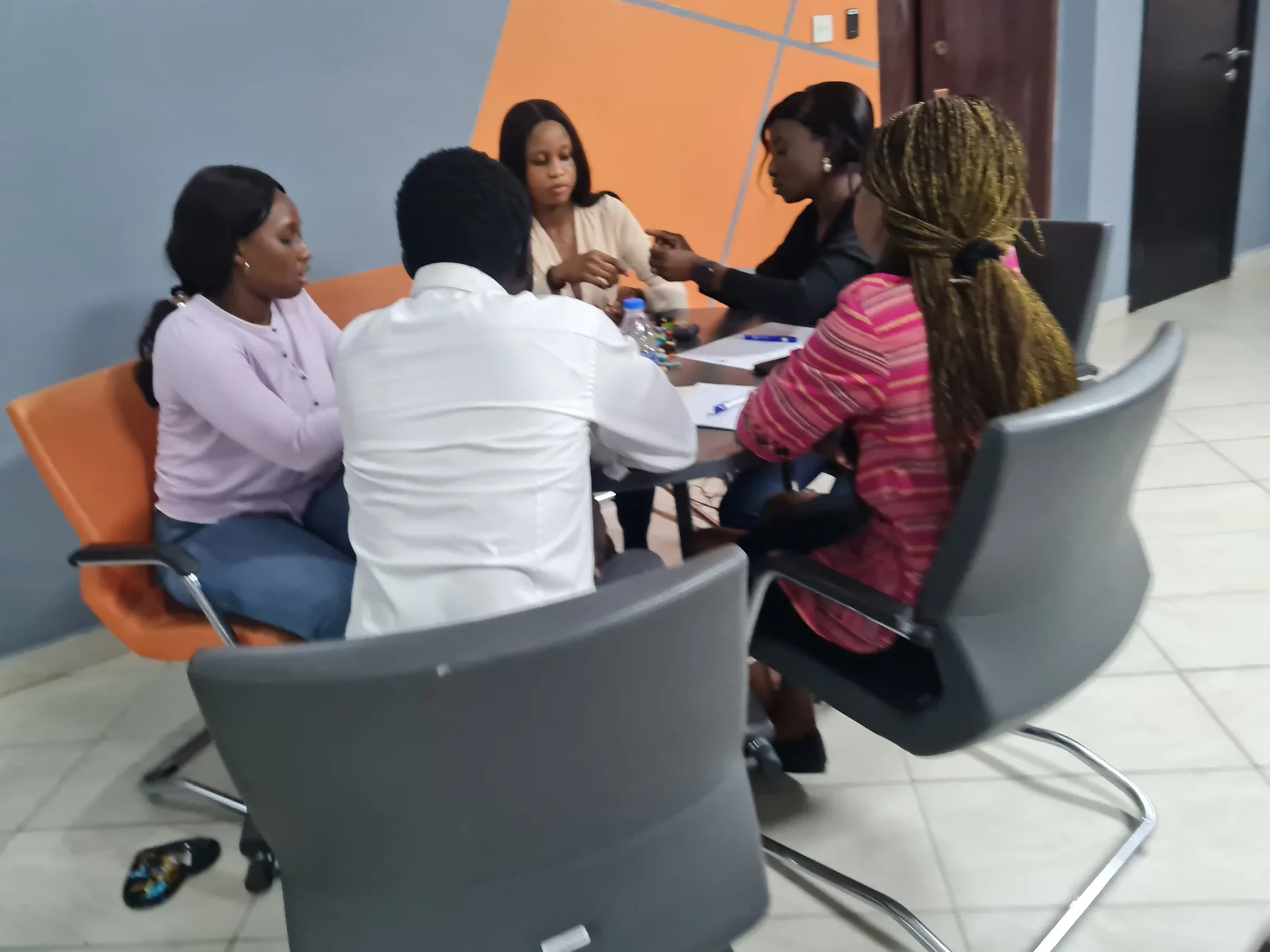 Workshop participants collaborating around a table